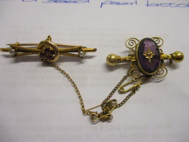 A Victorian yellow metal, amethyst and seed pearl brooch, together with a 15ct gold ruby and seed