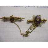 A Victorian yellow metal, amethyst and seed pearl brooch, together with a 15ct gold ruby and seed