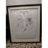 An England football shirt 2011-2013 with seven signatures and a certificate