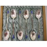 A set of six silver coffee spoons by Deakin & Francis Ltd, Birmingham 1934, with a double V