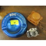 A miniature HIT camera and a BOAC ashtray