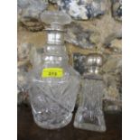 A cut glass silver rimmed decanter, together with a silver topped scent bottle A/F