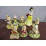 Royal Doulton figures to include Snow White and the Seven Dwarfs