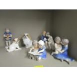 A group of Royal Copenhagen and Bing and Grondahl porcelain figurines and model animals to include a