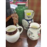 A Coalport figure entitled The Shepherd and various china and pottery jugs to include a