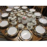 A decorative porcelain dinner/ coffee and tea service with leaf and gilt ornament