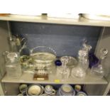 A mixed lot of glassware to include decanters, a claret jug, art glass and other items