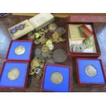 A selection of mixed badges and medallions to include a Metropolitan Police badge