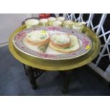 A mixed lot to include an Asian brass tray top table, a Copeland meat plate and a part set of a