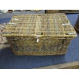 A vintage laundry basket with leather straps and metal supports, 20" x 36" x 21"