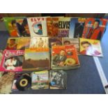 A quantity of 1950's-1990's records to include Elvis Presley and Cliff Richard