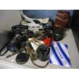 Photographic equipment to include a Carl Zeiss camera, lenses, Praktica lenses and other items