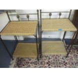 A pair of modern metal and rattan folding, two tier bedside tables with raised back rail