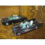 A Corgi Batman Batmobile together with a Corgi The Green Hornets Black Beauty