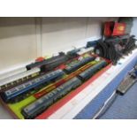 A selection of 00 gauge train accessories to include two engines, track and carriages