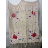 A beige silk piano shawl embroidered with multi coloured flowers, 58" square