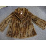 A vintage brown rabbit jacket, hip length, approximately a UK ladies size12