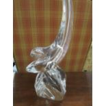 A Daum France art glass sculpture of a dolphin diving, 21 2/8" h, with an engraved signature to base