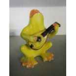 Delphin Massier for Vallauris Pottery, a French faience model of a singing frog playing the