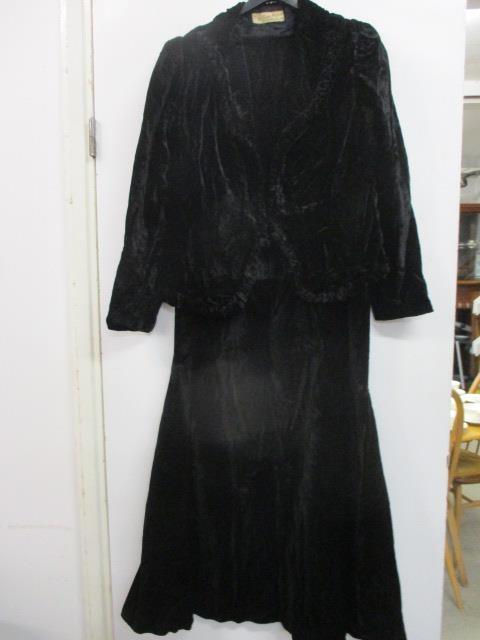 A vintage Harvey Nichols black velvet dress with matching jacket