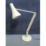 An Anglepoise Lighting Ltd, model 90 anglepoise lamp, circa 1970, painted in white, marks to base