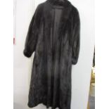 A 1980s ranch mink coat in dark brown, purchased from Cyru Kaye & Co of Goswell Road, London (