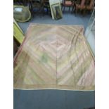 An Indian silk patchwork panel with golden silk thread, lined, fashioned as a tablecloth, (some