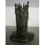 A contemporary bronze sculpture of a group of figures, unsigned, 6 1/2" h