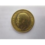 A George V 1913 gold half-sovereign with St George to the obverse