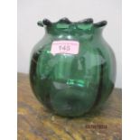 A Victorian green glass vase