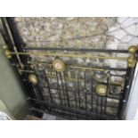 A Victorian brass and iron double bed framed having mother of pearl decoration