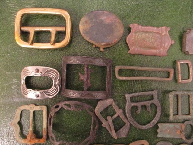 A collection of metal detector finds, mainly buckles and artefacts to include early bronze, brass, - Image 3 of 3
