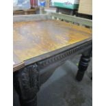 A 19th century and later carved oak table having acanthus carved and turned legs, 28 1/2" h x 36 1/