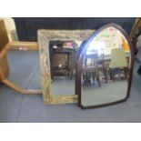 A mahogany framed gothic shaped wall mirror, a modern driftwood framed wall mirror, a modern