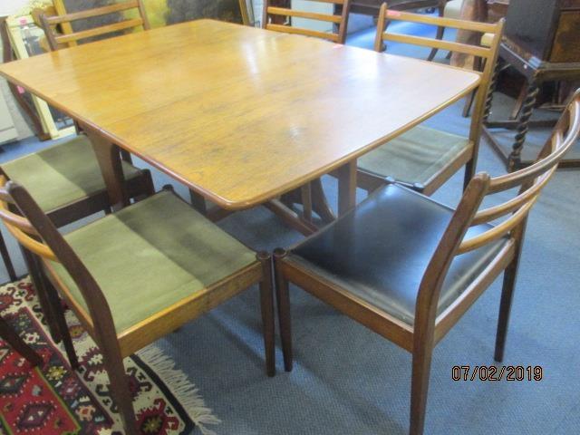 A G-Plan teak drop leaf table and six matching G-Plan chairs with ladder backs - Image 2 of 3