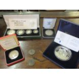 A 1996 Her Majesty Queen Elizabeth II 70th Birthday silver proof crown, a Guernsey silver £10