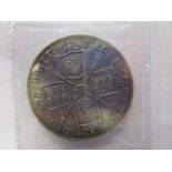 An 1889 Queen Victorian double florin silver coin