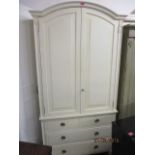 A Leporello modern cream painted armoire
