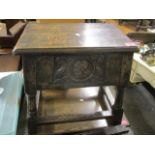 A 1930s oak hinged top stool, 19" h x 20"w