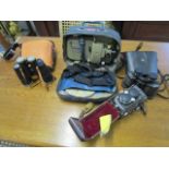 A leather cased Yashica 635 camera, a Miranda 8 x40 wide angle pair of binoculars in a case,