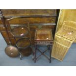 A 1930s oak cake stand, a mahogany kettle stand with fretwork sides, A/F, a modern wicker toilet