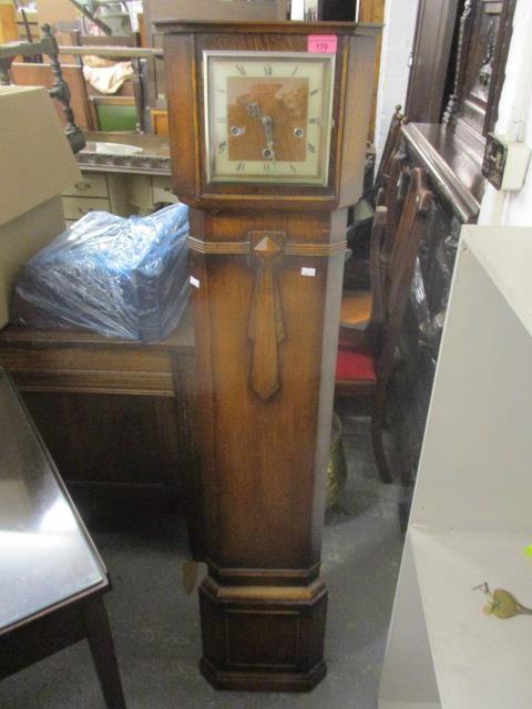 A 1930s oak cased corner grandmother clock,, 57" h