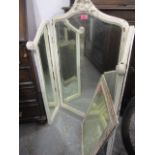A French style white painted shabby chic, three fold dressing table mirror and a smaller wall mirror