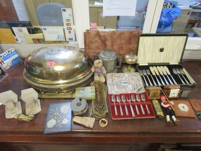 A mixed lot to include a Victorian brass desk bell and a Youngs fishing reel and flies