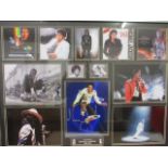 A mounted collection of Michael Jackson photographs, one central photograph hand signed by the