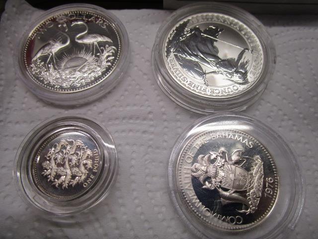 A selection of British and Commonwealth silver coins to include a one and two dollar Bahamas - Image 2 of 4