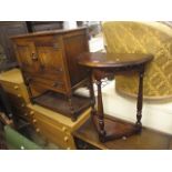 A reproduction oak linen fold side cabinet, together with a demi lune side table