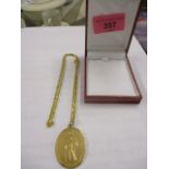 A 9ct gold oval St Christopher pendant with a 9ct gold chain total weight 13.7g