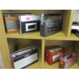 A mixed lot to include modern and retro radios, to include two Roberts radios, (7)