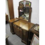 An mid 20th century oak gothic style dressing table, 62"h x 46"w